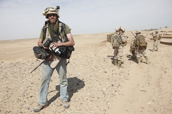 Author / Photographer Ed Darack during a combat operation with U.S. Marines outside of Marjah, Afghanistan. Copyright Ed Darack; Permission granted for use in media products about / related to Ed Darack's creative work. width=