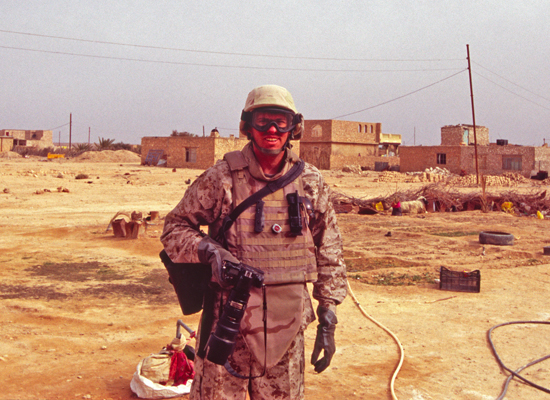 Author / Photographer Ed Darack while he was embedded with U.S. Marines during a combat operation in the streets of the city of Haditha, Al Anbar Province, Iraq. Copyright Ed Darack; Permission granted for use in media products about / related to Ed Darack's creative work. width=
