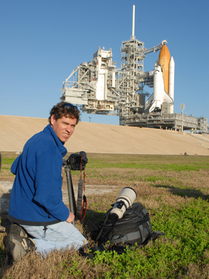 Author / Photographer Ed Darack photographing Space Shuttle Endeavour from within the inner perimeter of Launch Pad 39A at Kennedy Space Center, Florida, one day prior to launch. Copyright Ben Cooper / launchphotography.com; Permission granted for use in media products about / related to Ed Darack's creative work. width=