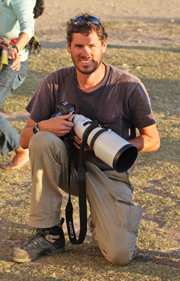 Author / Photographer Ed Darack at Num Village, returning to Kathmandu, Nepal, from Makalu, the fifth highest mountain in the world, during a photography expedition to Nepal. Copyright Ed Darack; Permission granted for use in media products about / related to Ed Darack's creative work. width=